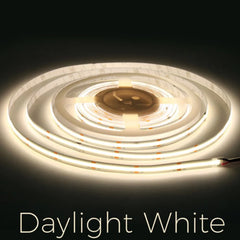 Roll of LED strip light labeled 'Daylight White' on a dark background