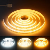 Roll of LED strip light with three color options on a dark background