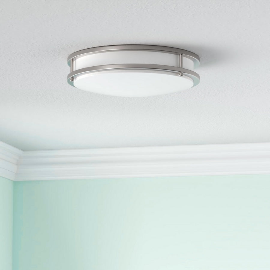 Ceiling light fixture in a room with light blue walls at fliptoled