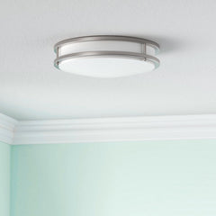 Ceiling light fixture in a room with light blue walls at fliptoled