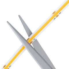 Two crossed drumsticks with white shafts and yellow tips on a white background