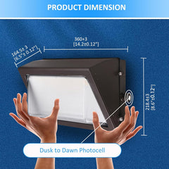 Dimensions of a led wall pack light fixture with hands for scale on a blue background
