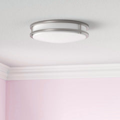 Ceiling light fixture in a room with pink walls at fliptoled