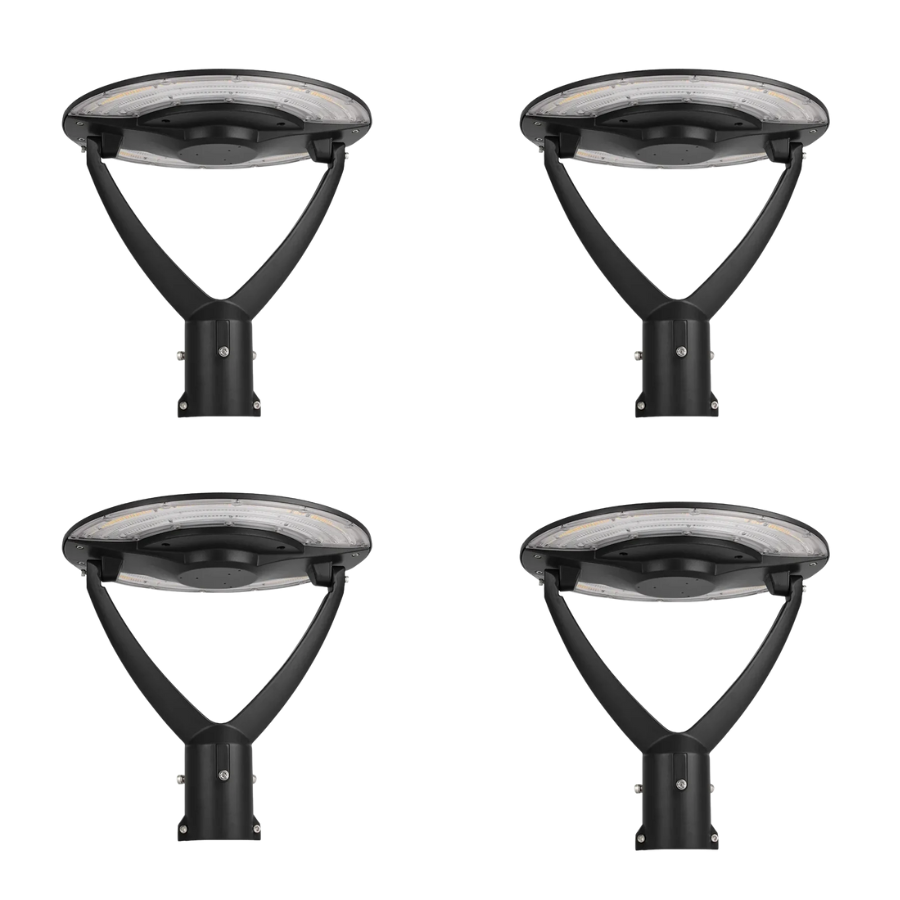 Four black outdoor street lights on a white background