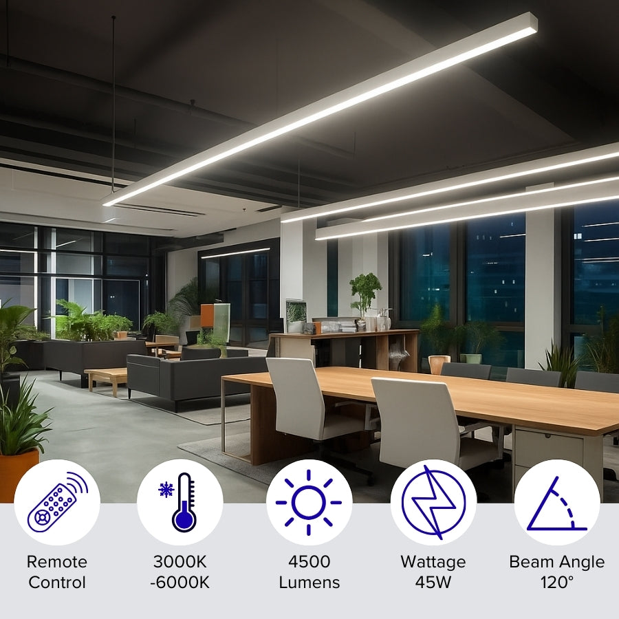 Modern office interior with linear ceiling lights, desk, chairs, and plants.