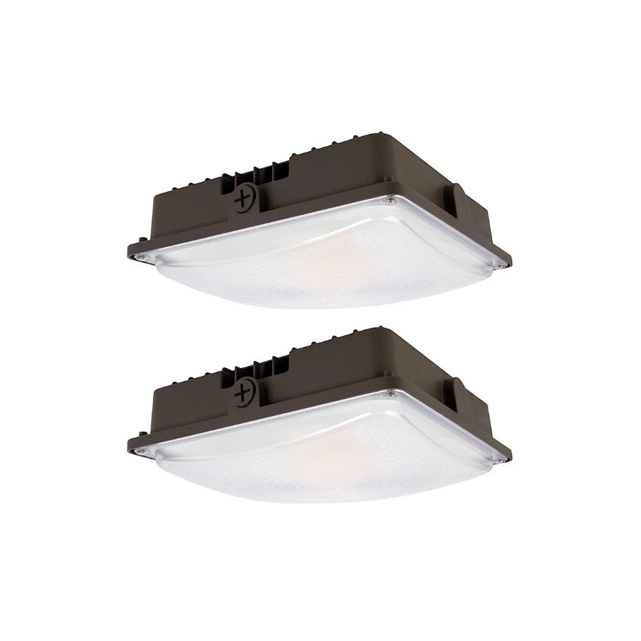 Two square ceiling lights with brown frames on a white background