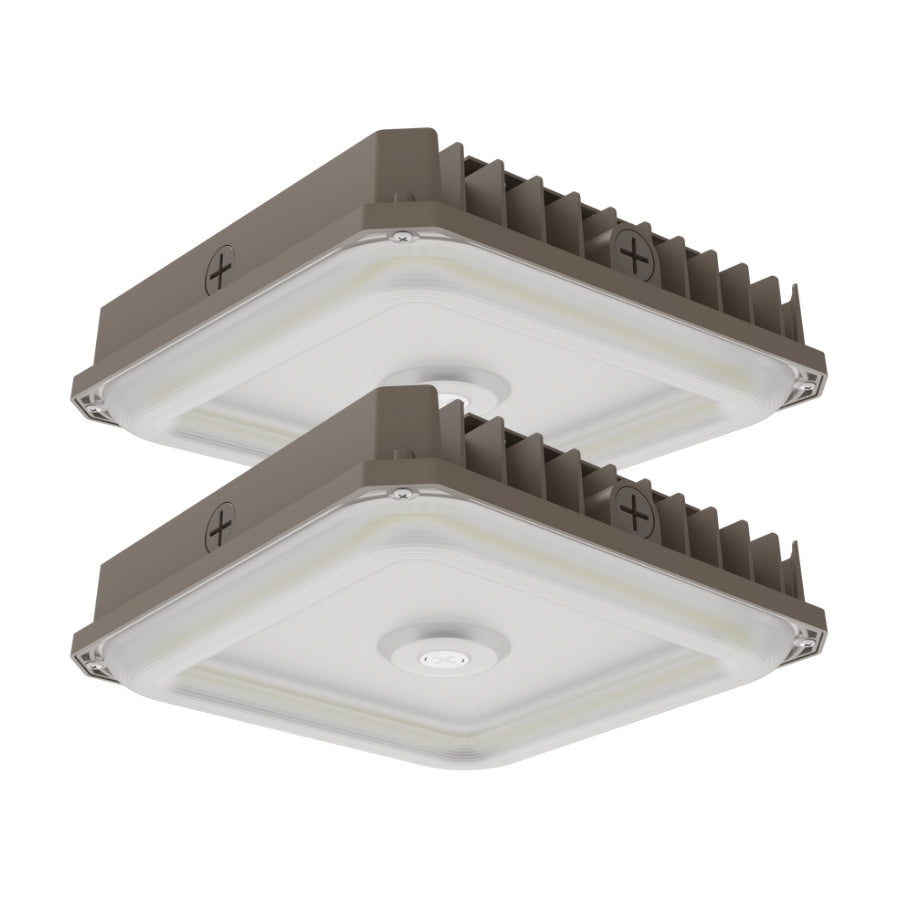 Two square ceiling lights with brown grills on a white background