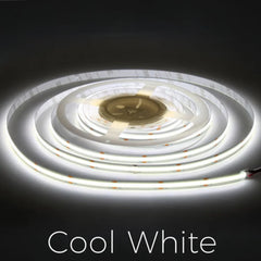 Roll of cool white LED strip light on a dark background