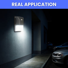 Wall-mounted security light illuminating a dark alleyway with parked cars. led mini wall pack light 20w with photocell in usa​

