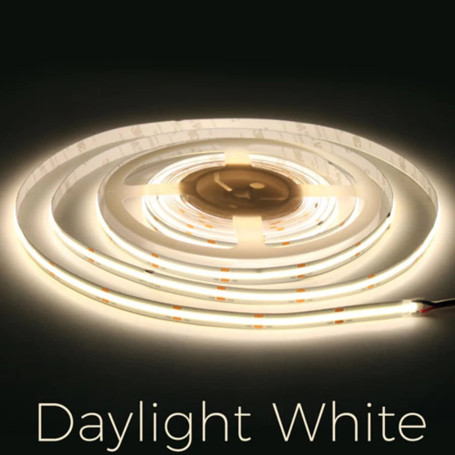Roll of LED strip light labeled 'Daylight White' on a dark background